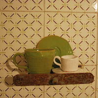 tazze artigianali in ceramica verde e bianca